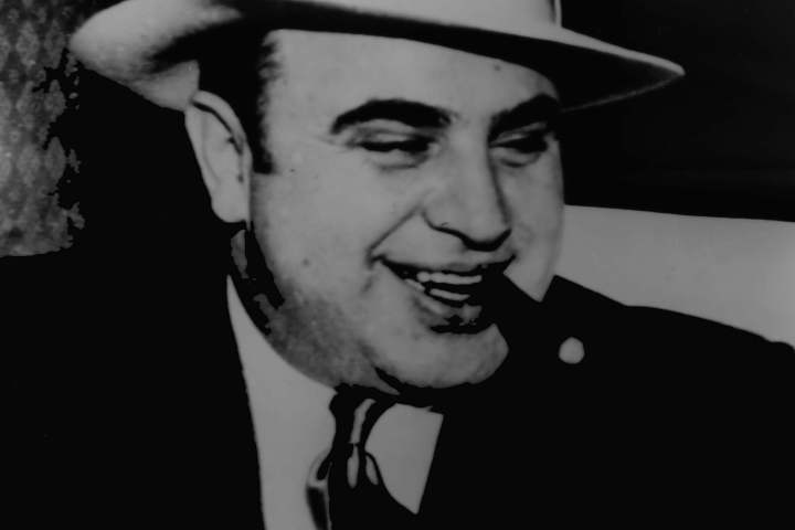 Al Capone smoking a cigar